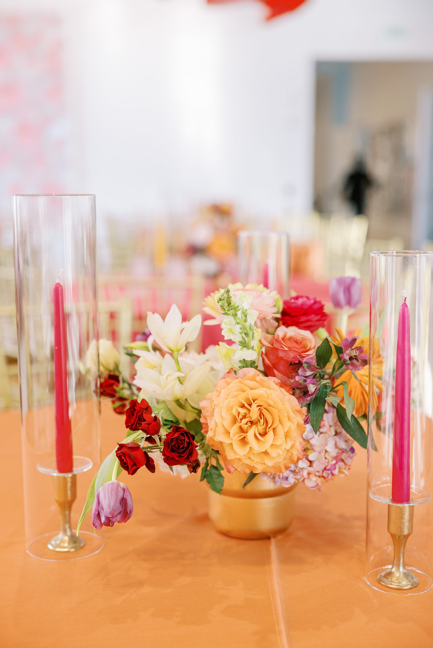 white, pink, and orange floral centerpieces for Mehndi Day at the Tampa Museum of Art