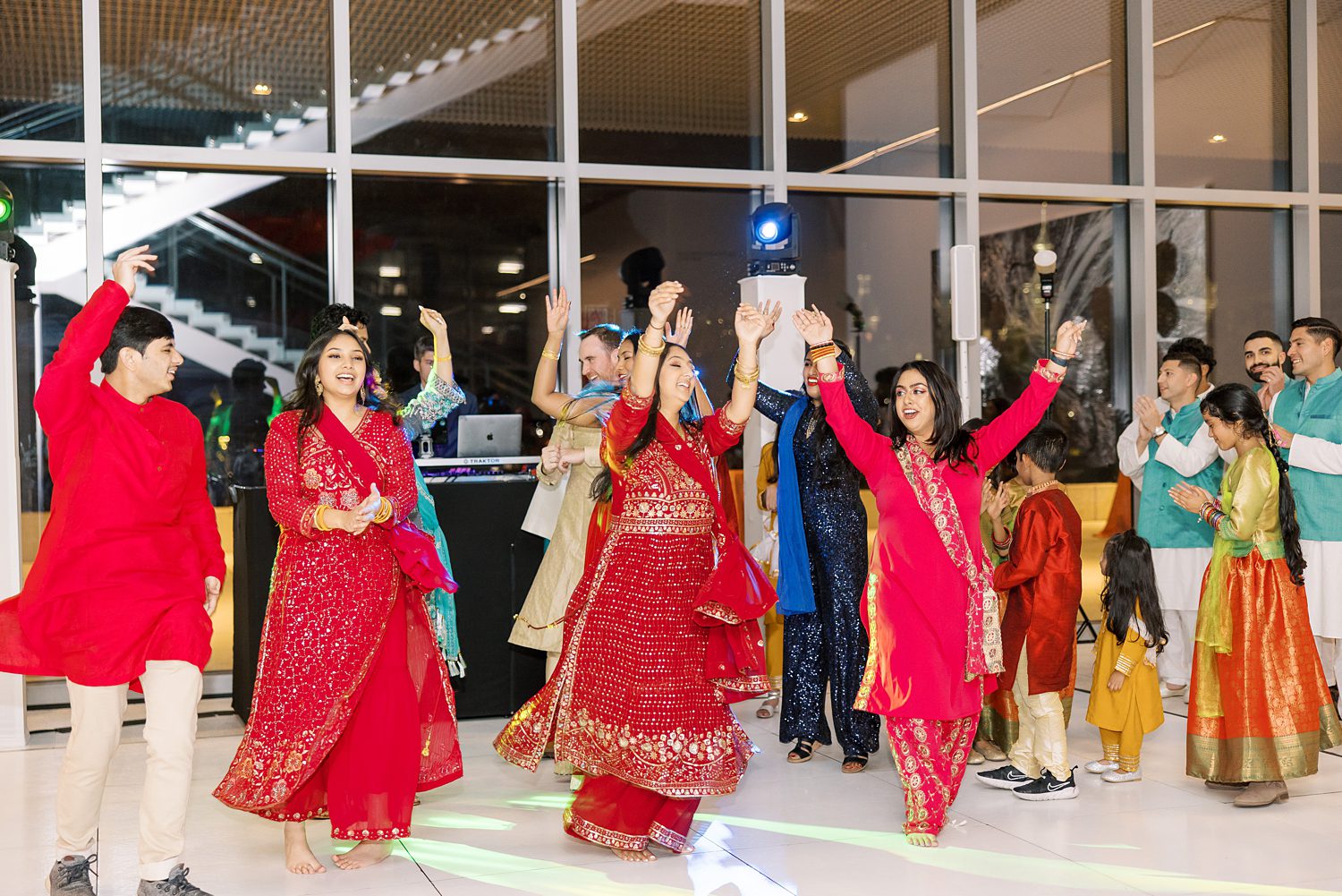 women dance during Mehndi Day in Tampa FL museum