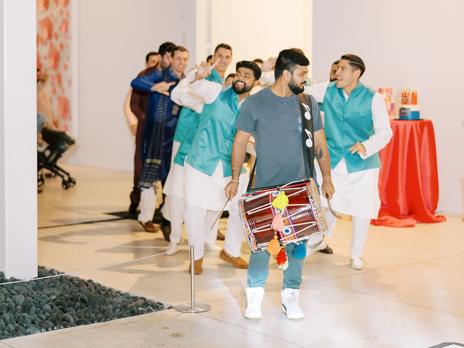 men enter reception during  Mehndi Day in Tampa FL museum 