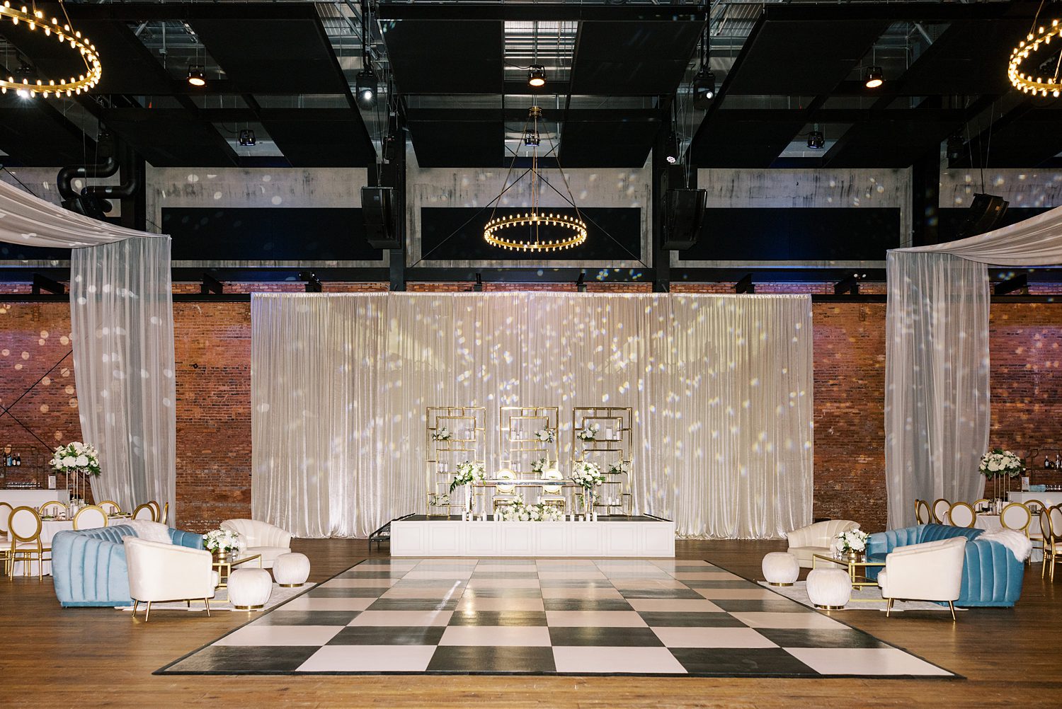 dance floor and seating area for traditional wedding reception at Armature Works