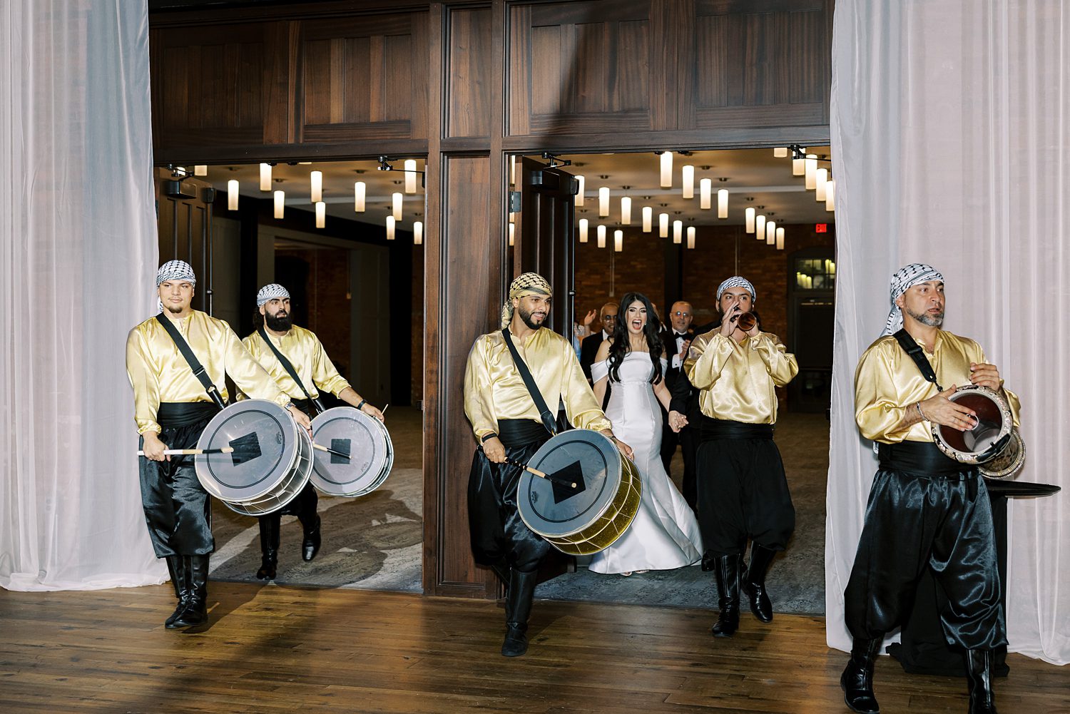 traditional Palestinian drum entrance for traditional wedding reception at Armature Works