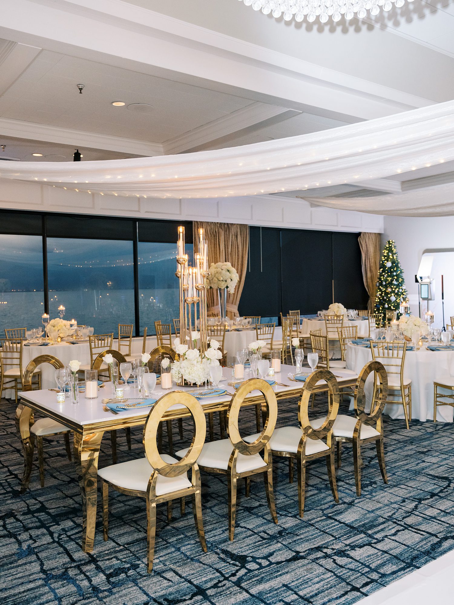 winter wedding reception at the Rusty Pelican in Tampa FL with gold and ivory details 