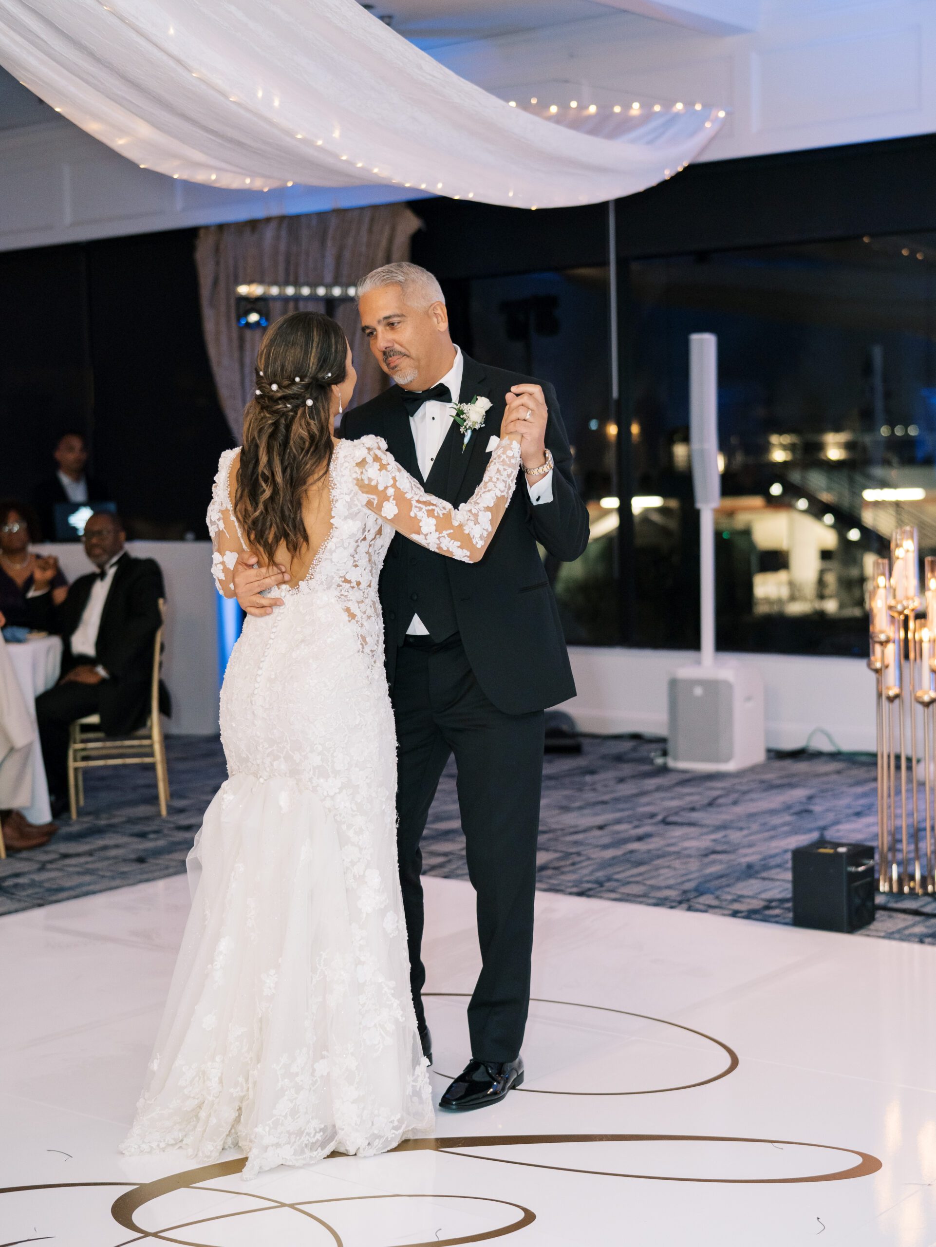 bride dances with father during Rusty Pelican Tampa wedding reception