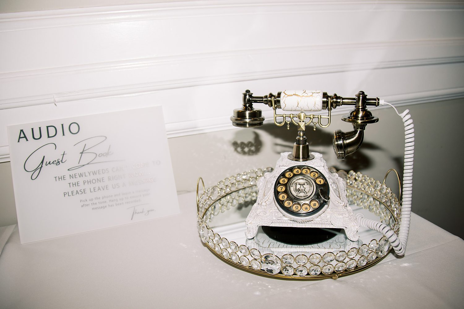 audio guest book sits on mirrored tray for Rusty Pelican Tampa wedding reception