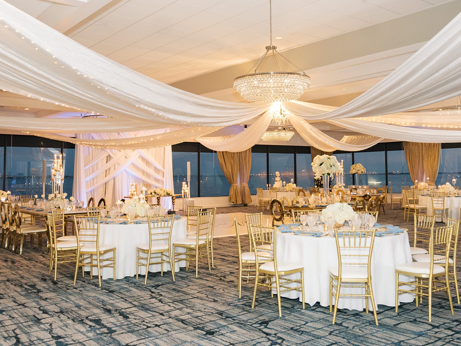 white and gold tables for Rusty Pelican Tampa wedding reception