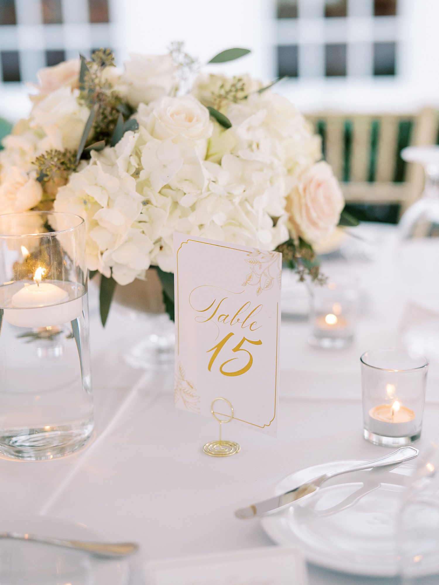 Tampa Yacht Club wedding reception with blush and ivory flowers