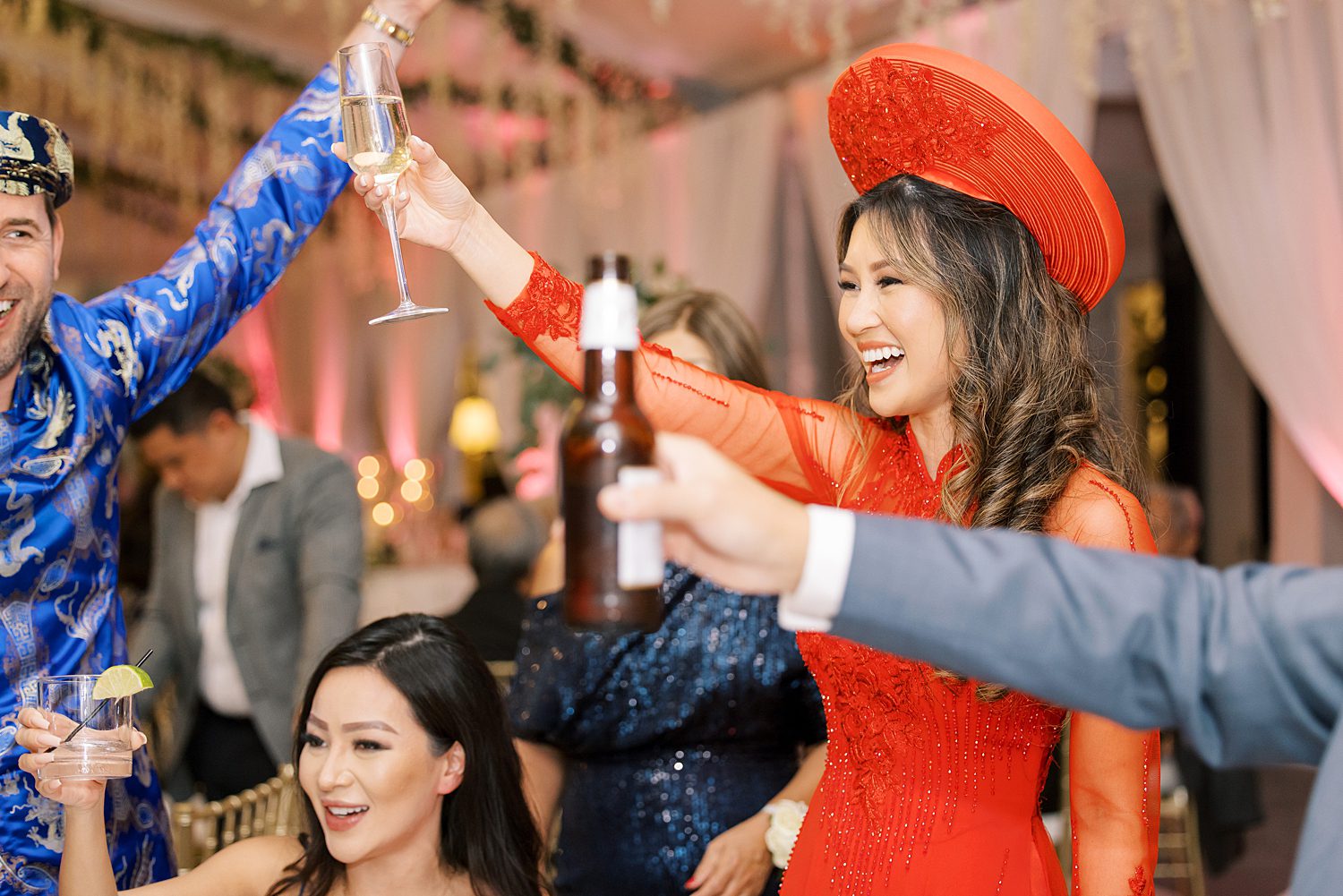 newlyweds in traditional Vietnamese wedding attire complete Chao Ban at wedding reception 