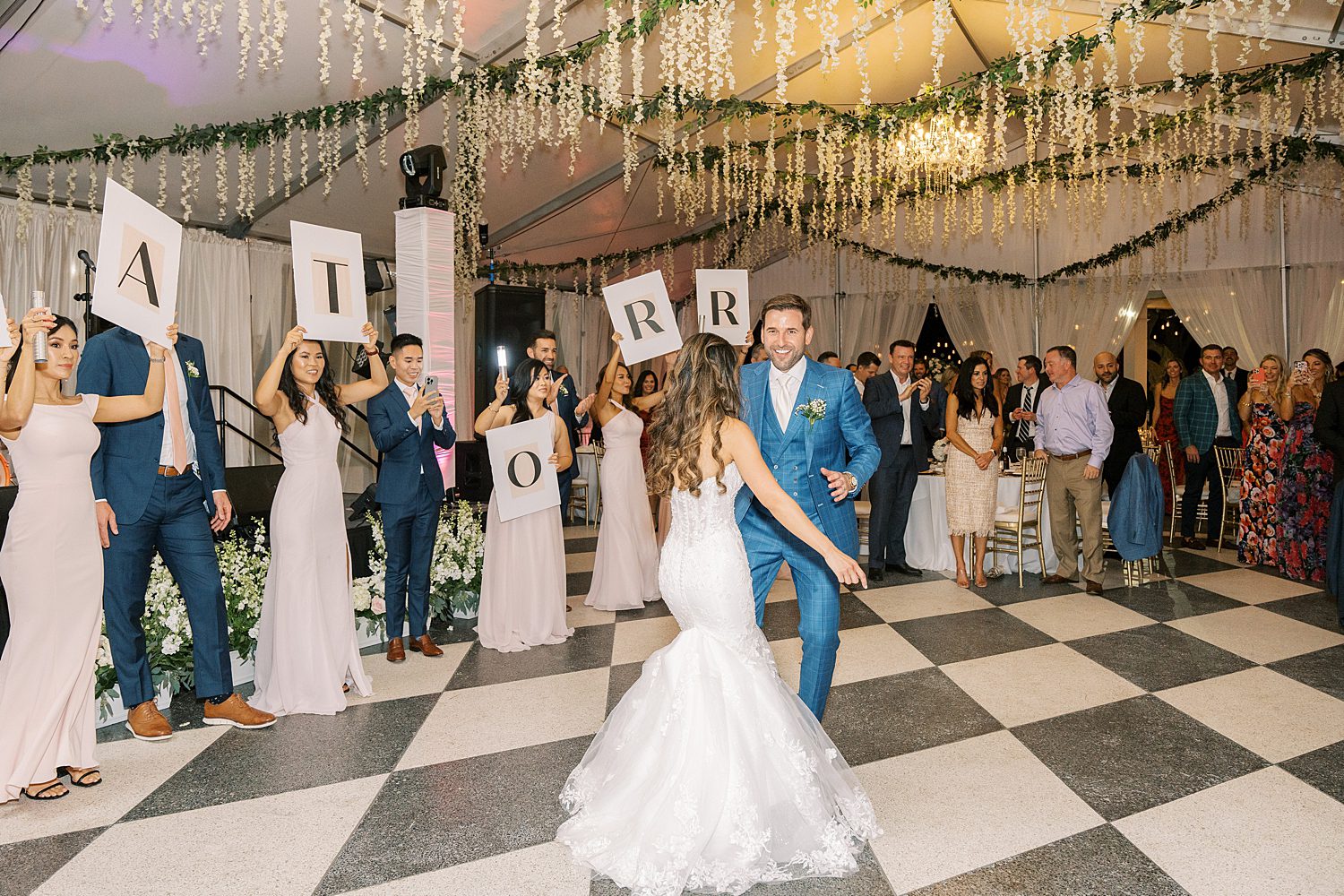bride and groom dance during Tampa FL wedding reception 
