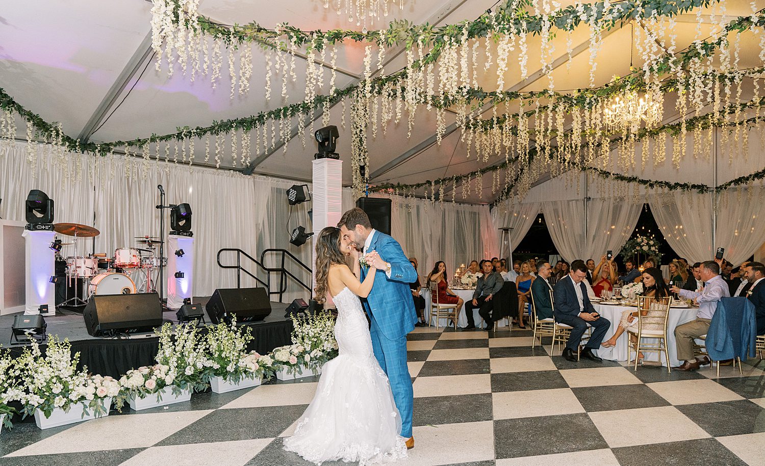 bride and groom dance under tent at Tampa Yacht Club