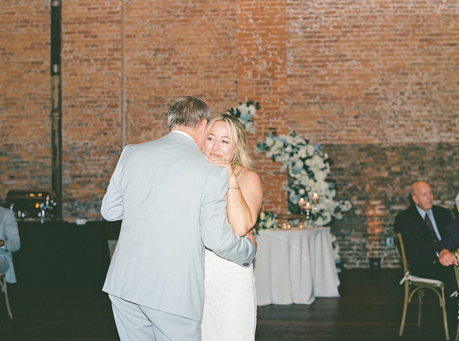bride dances with groom during wedding reception at Armature Works