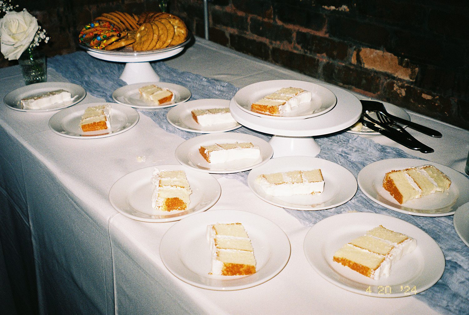 slices of wedding cake on dessert table