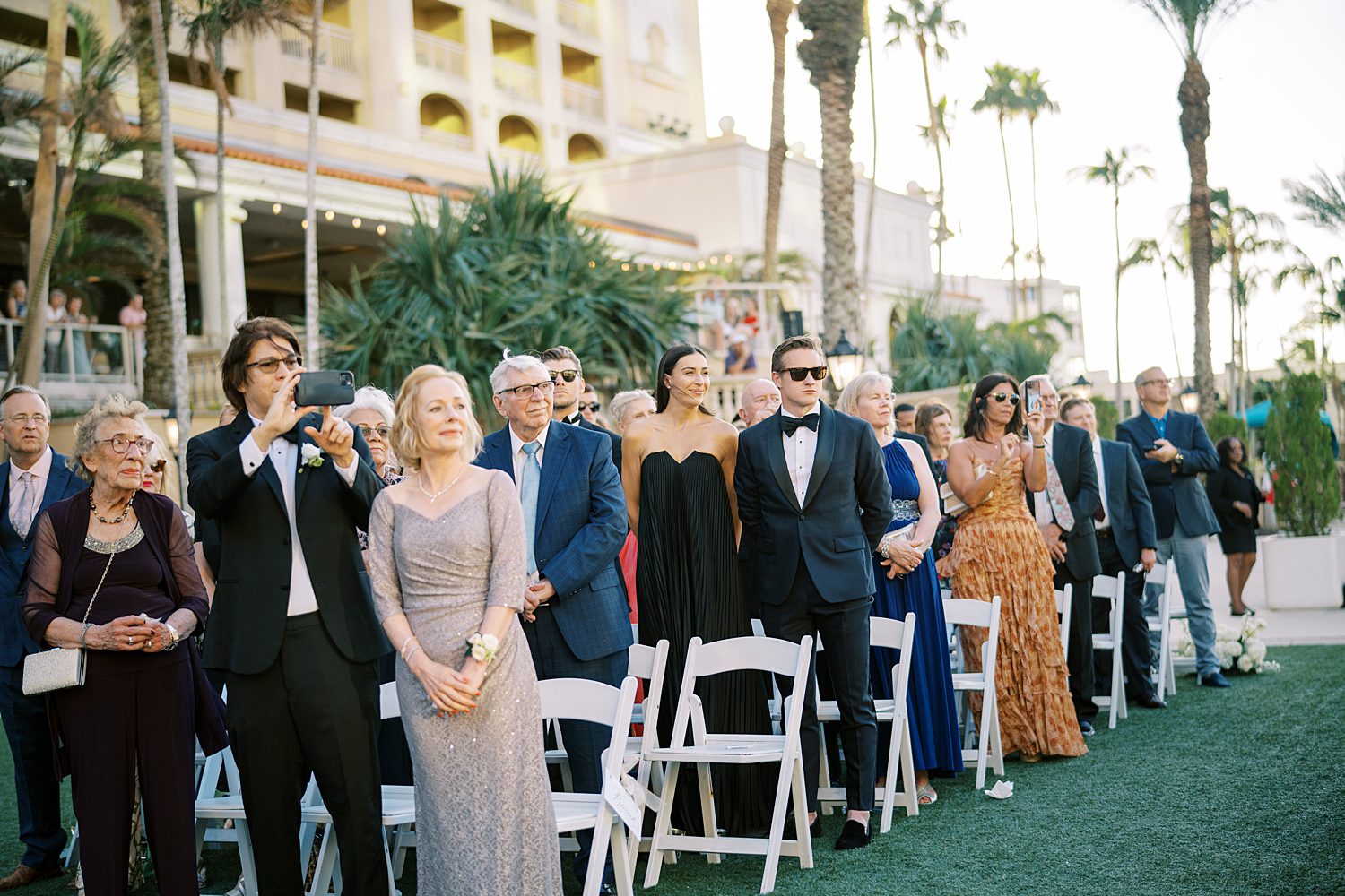 wedding guests watch ceremony on lawn at the Ritz Carlton Sarasota