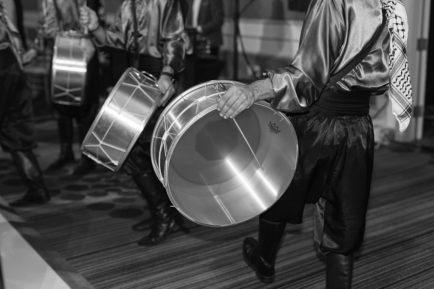 Al Fursan and Dabke performers beat on drum
