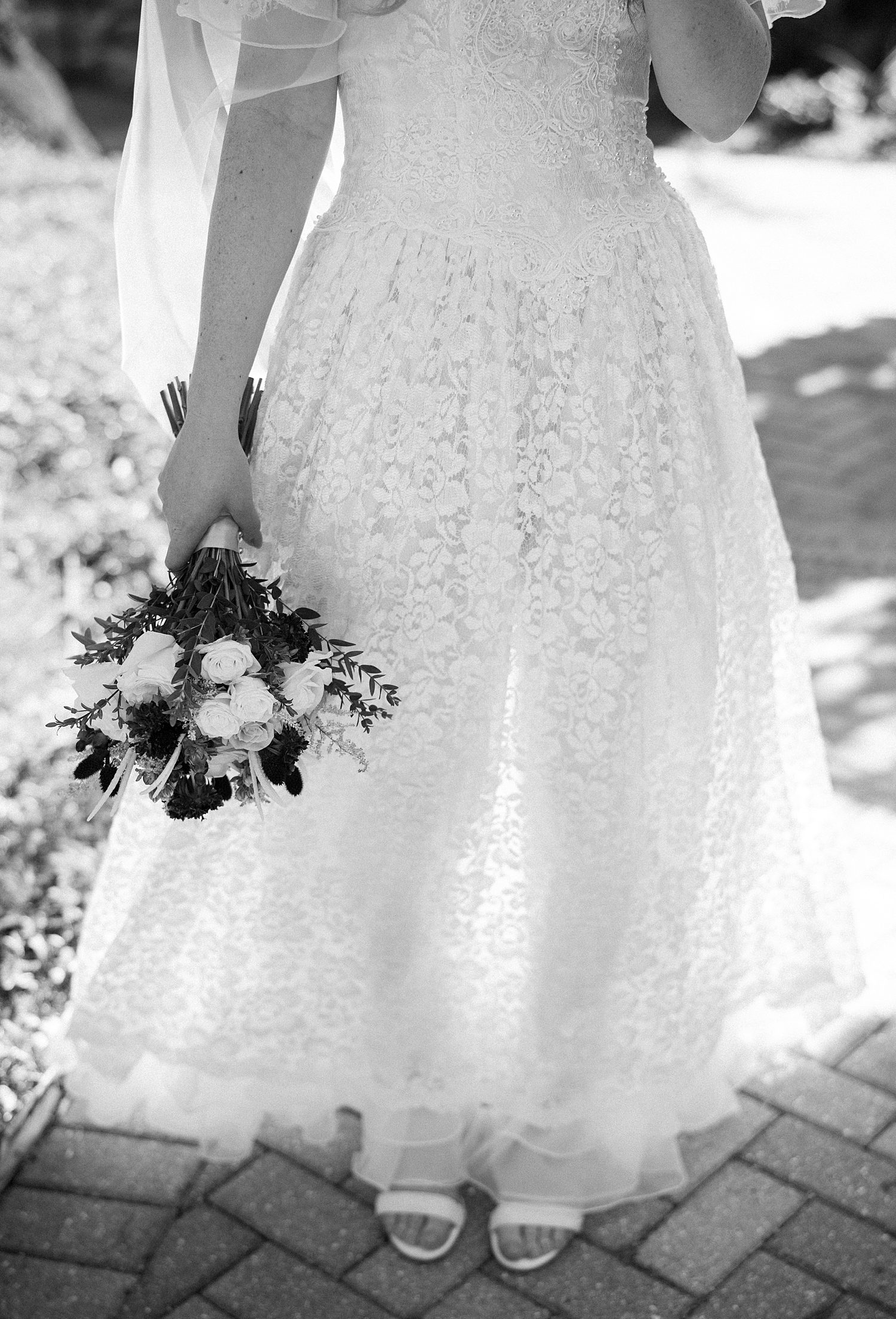 bride's wedding dress redesigned from mom's wedding dress