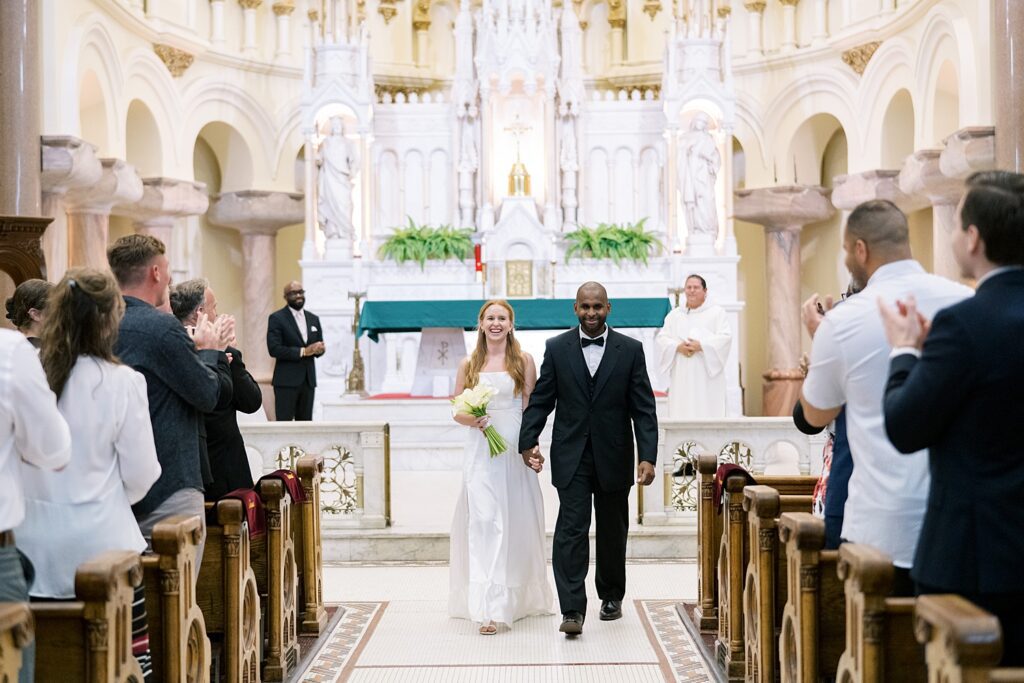 bride and groom exit wedding ceremony