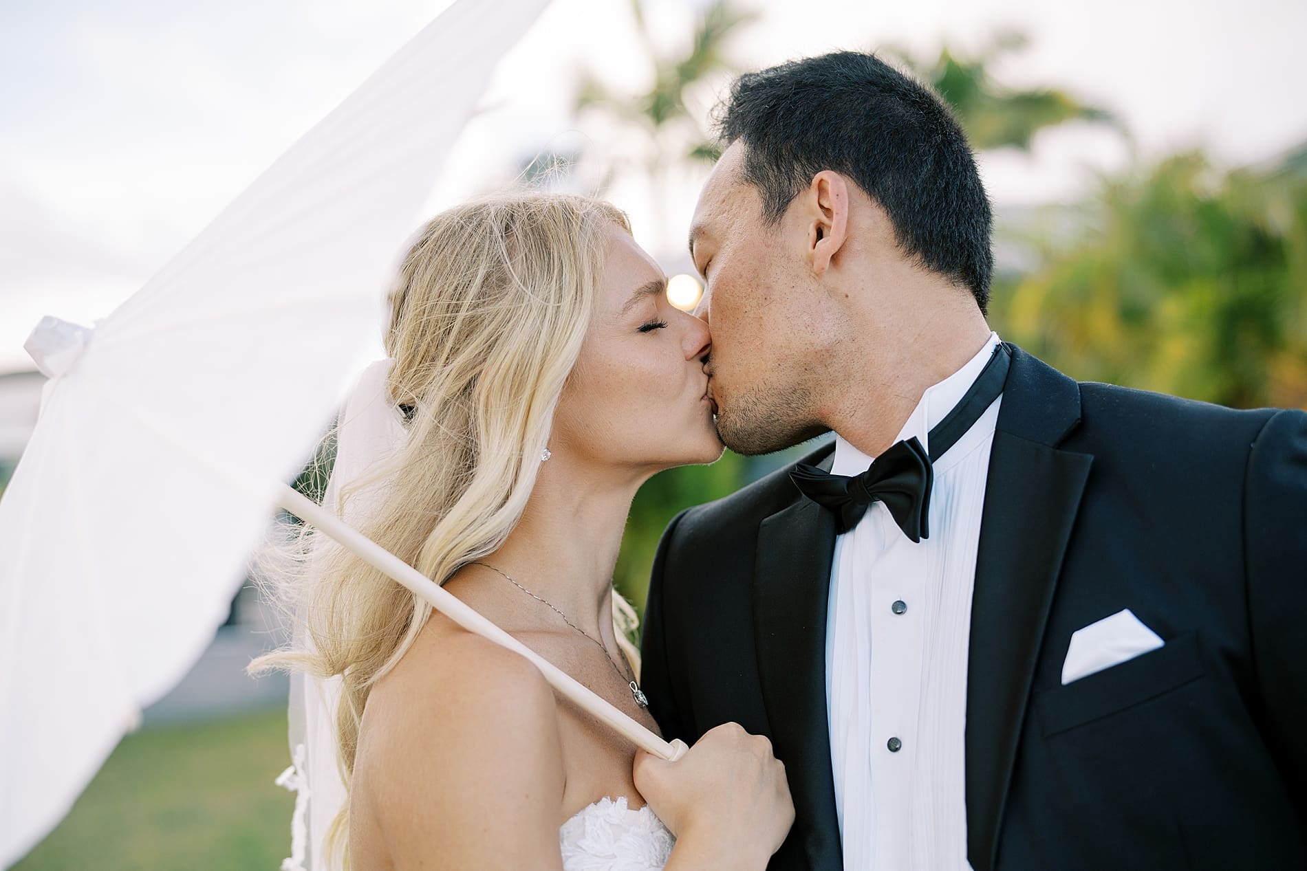 newlyweds kiss after Airbnb Wedding in Tampa Florida