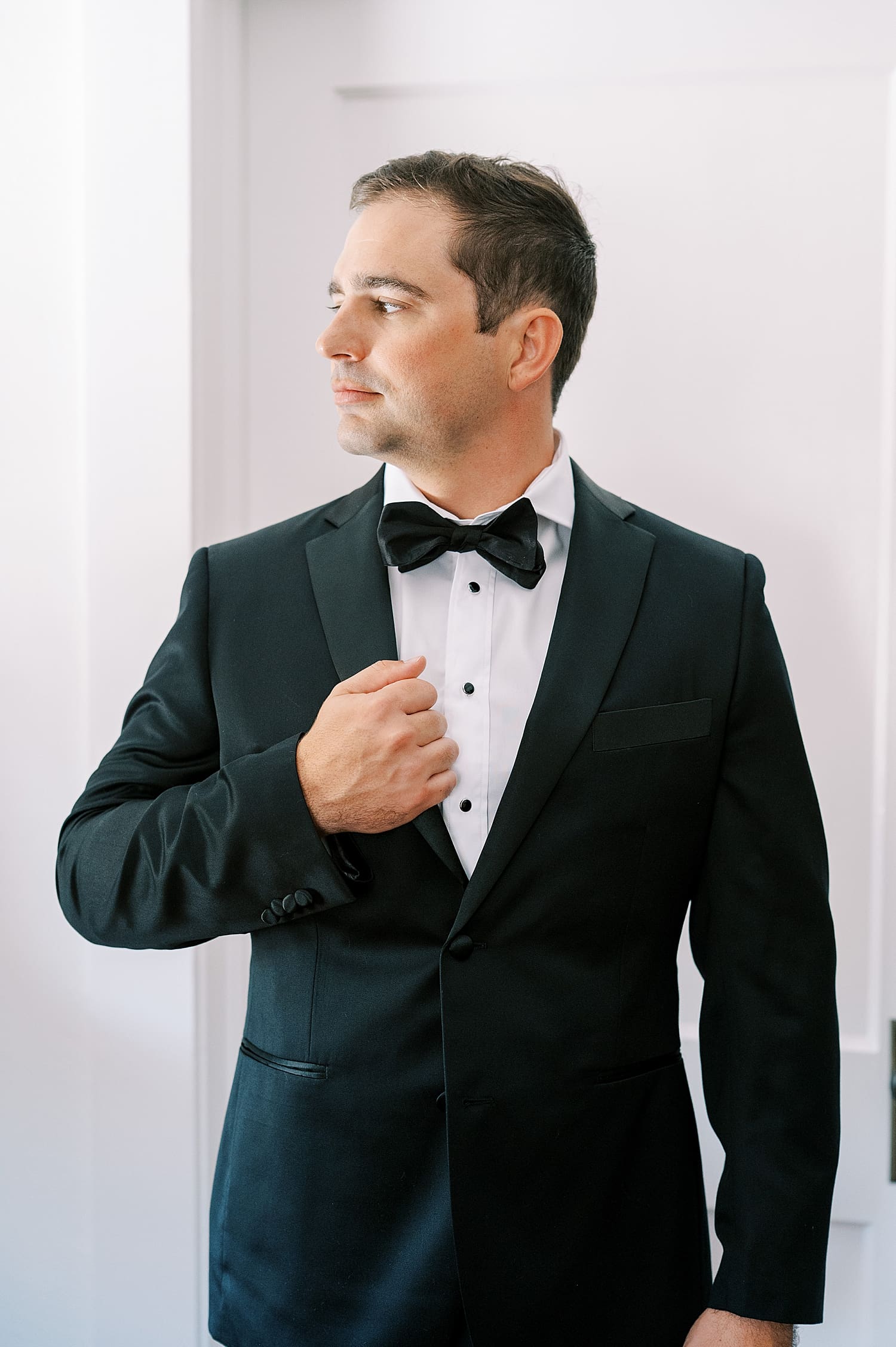 groom in tux