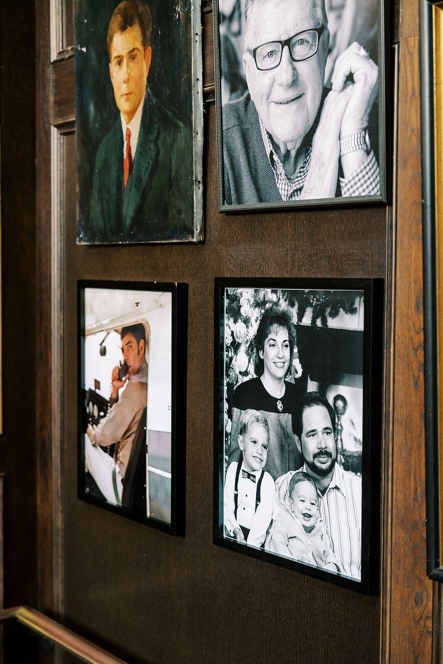 photos on wall of family members who have passed 