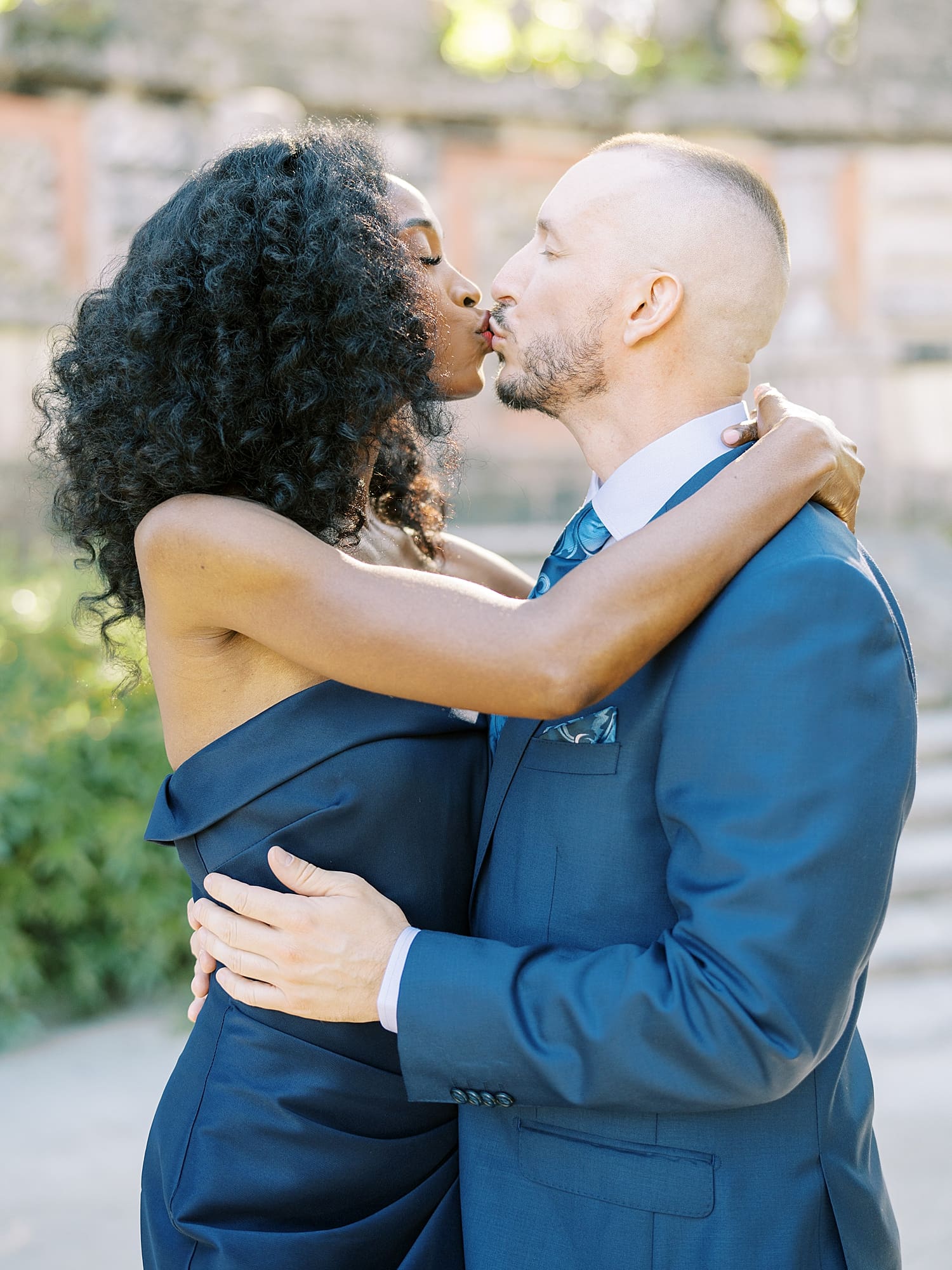 engaged couple kiss during engagement session in Miami Florida 