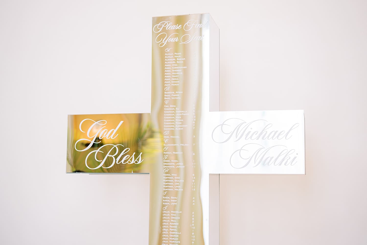 mirrored seating chart in cross shape for baptism 