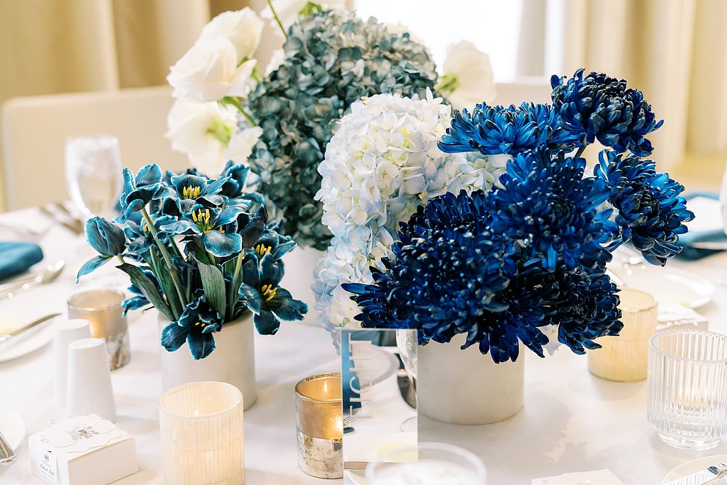 The Tampa Edition Event Space decorated with blue and white florals 