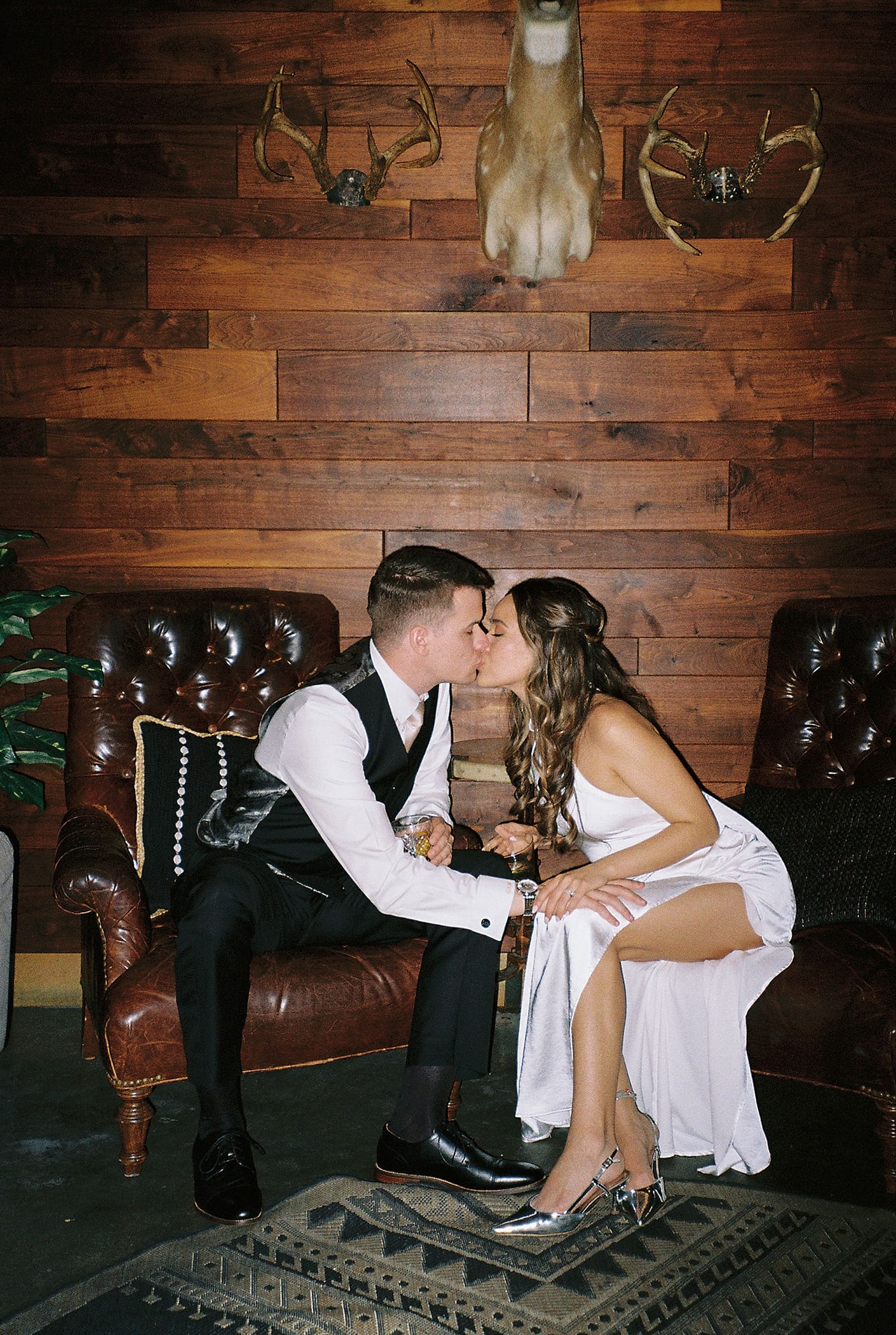 newlyweds kiss at reception