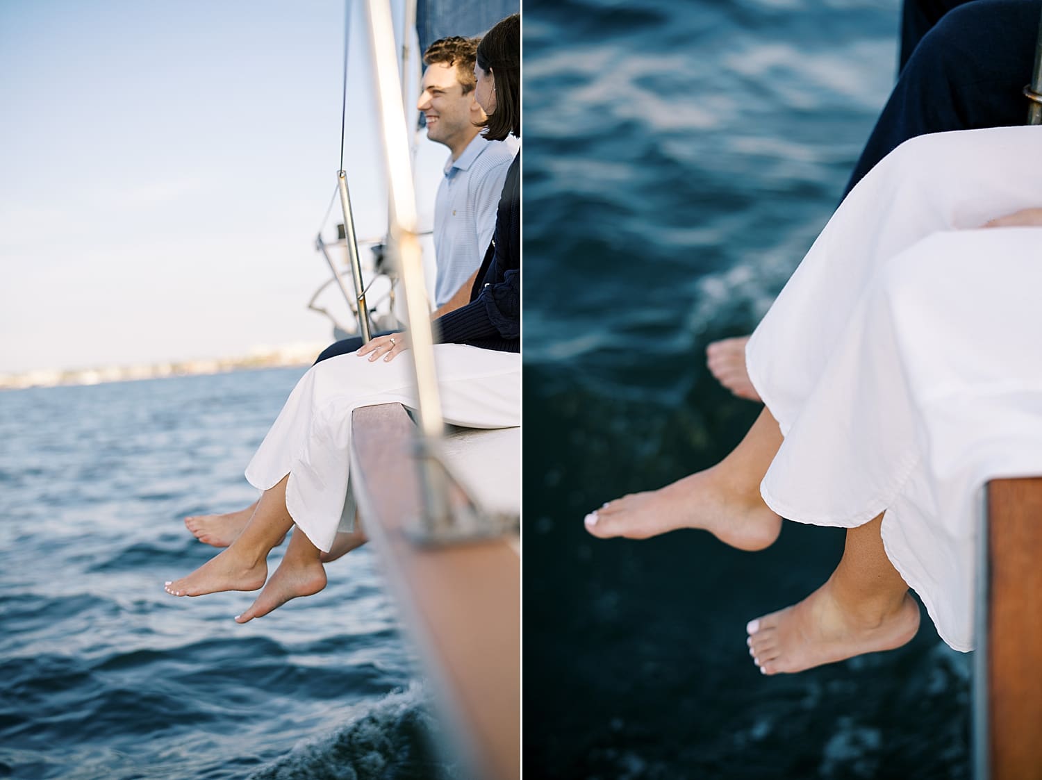 couple sit on edge of sailboat and hang their legs over side of boat
