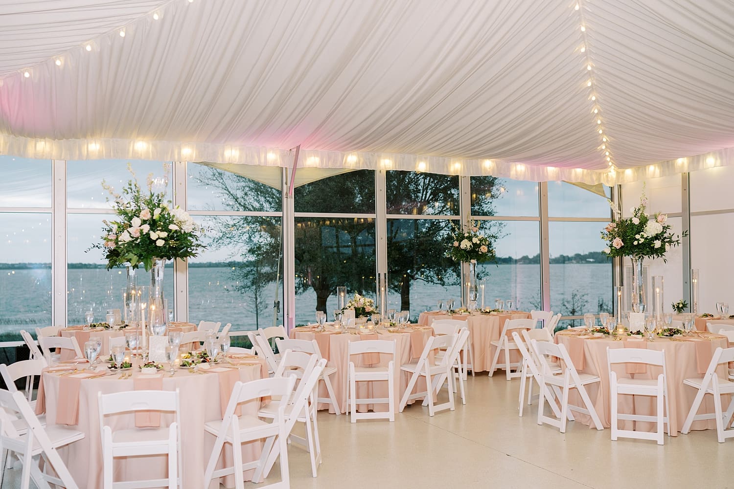 tented FL wedding reception at Adams Estate with views of Lake Alfred