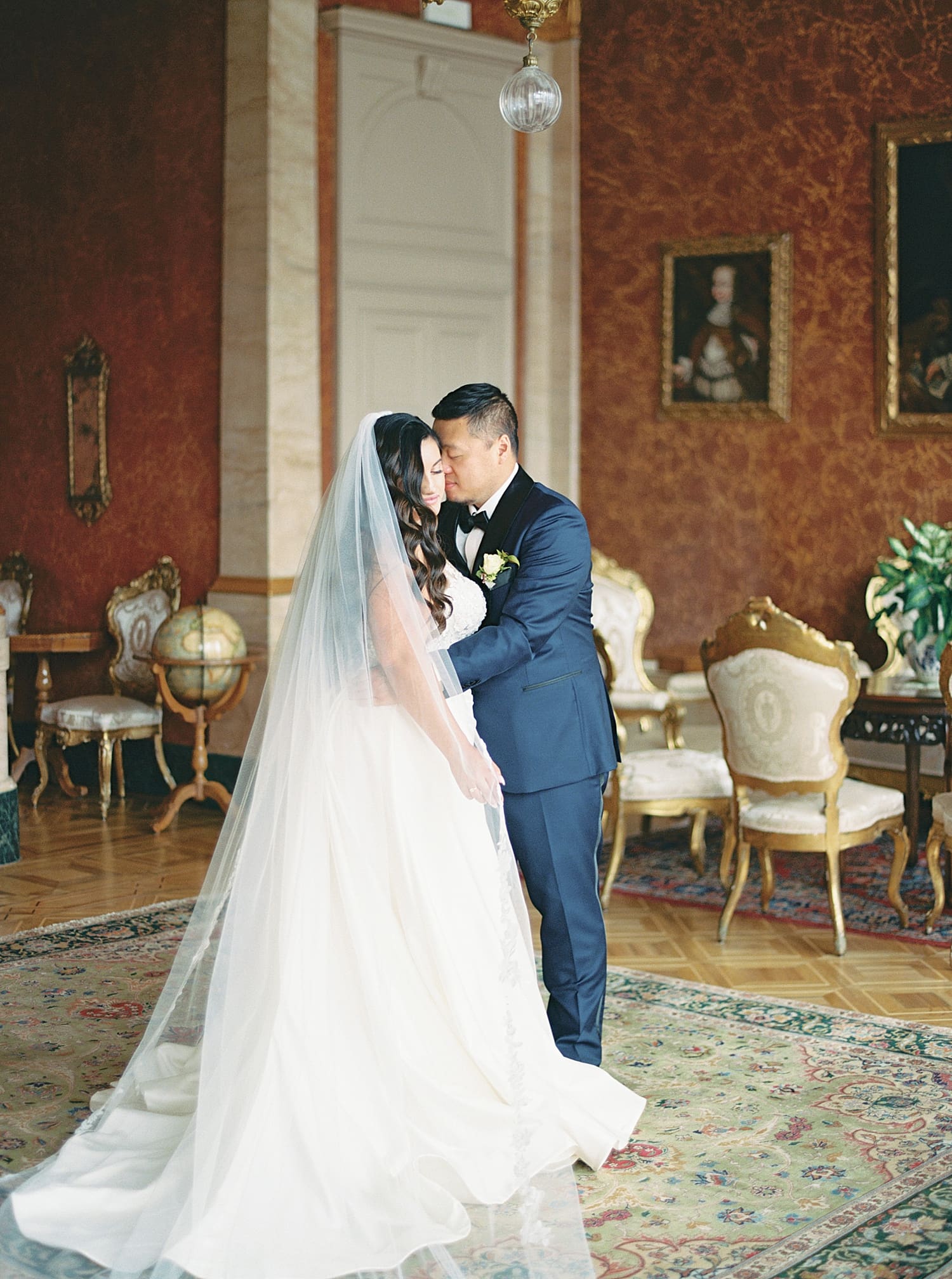 bride and groom kiss inside Grand Hotel Villa Serbelloni