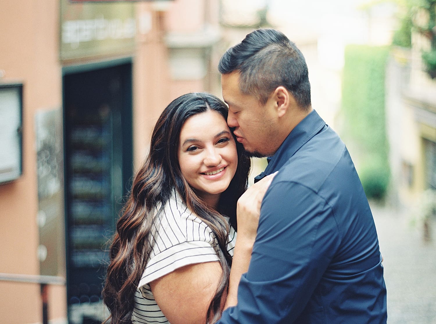 couple embrace durng Lake Como Engagement Session in Bellagio